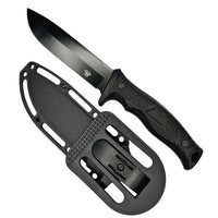 Black knife with sheath on a white background