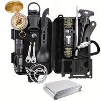 Collection of survival tools including a compass, knife, and multitool on a white background