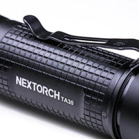 BlackNextorch TA30 flashlight on a white background