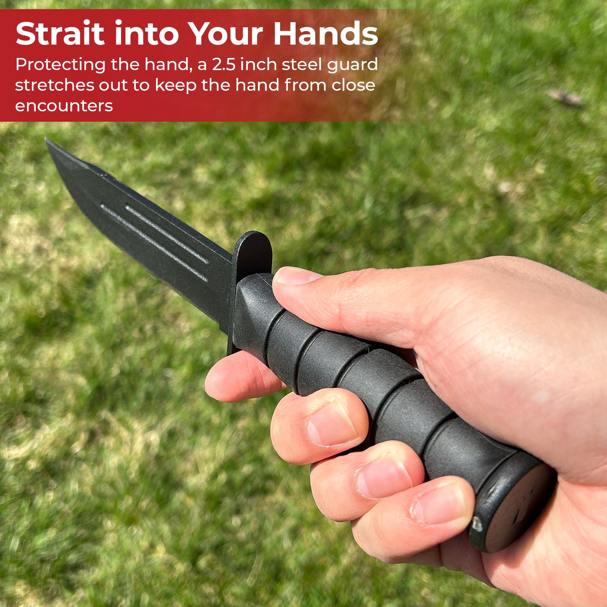 Hand holding a black knife with text about a 2.5 inch steel guard on a grassy background