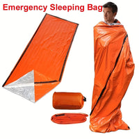 Orange emergency sleeping bag with a man demonstrating its use on a white background