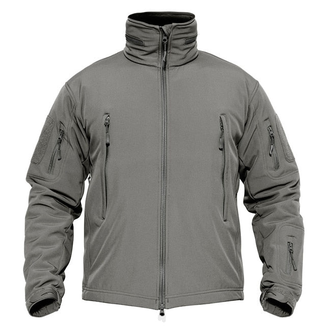 Gray tactical jacket with multiple zippers on a white background